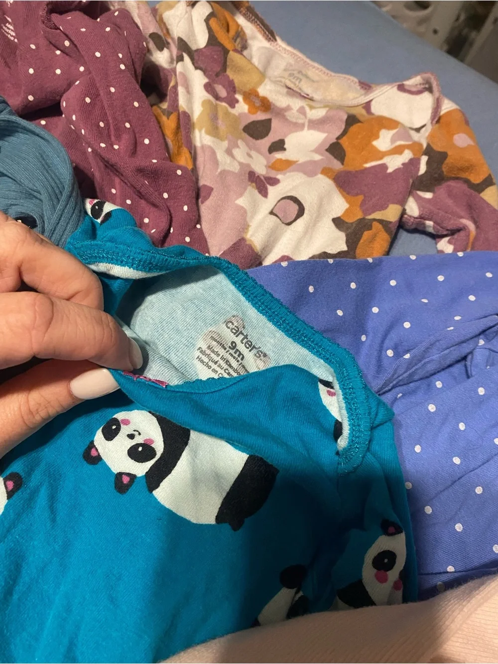 Bundle of six long sleeve onesies 9 months